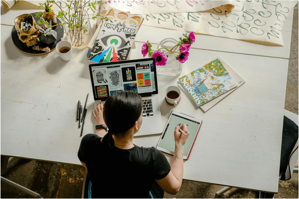 A Women Working on Her Laptop Showing How to Create Digital Products And Sell Them 