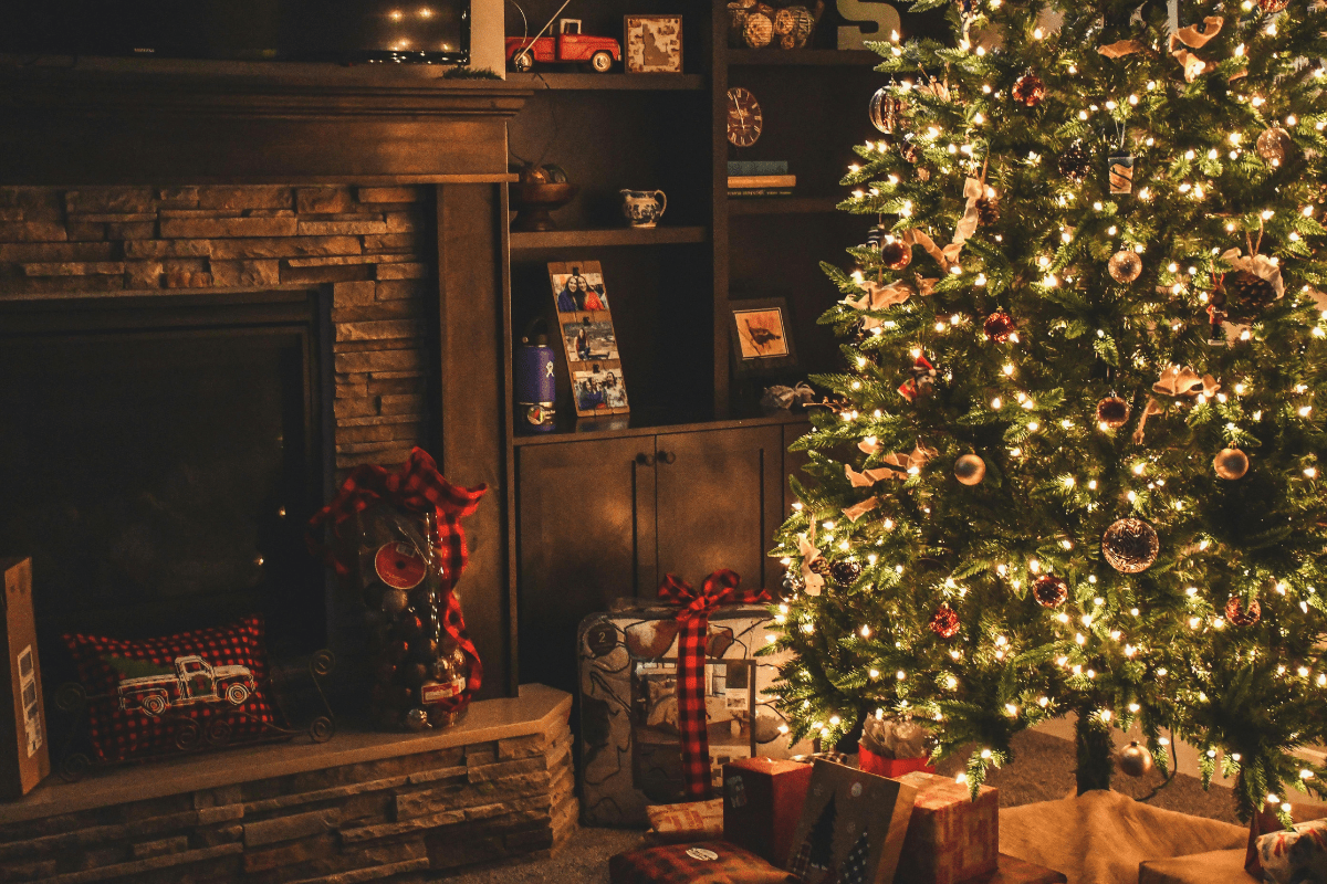 Christmas Tree Decoration - Side Hustles for Christmas Christmas Tree Set Up in Home near Fire Place Illustrating Side Hustles for Christmas