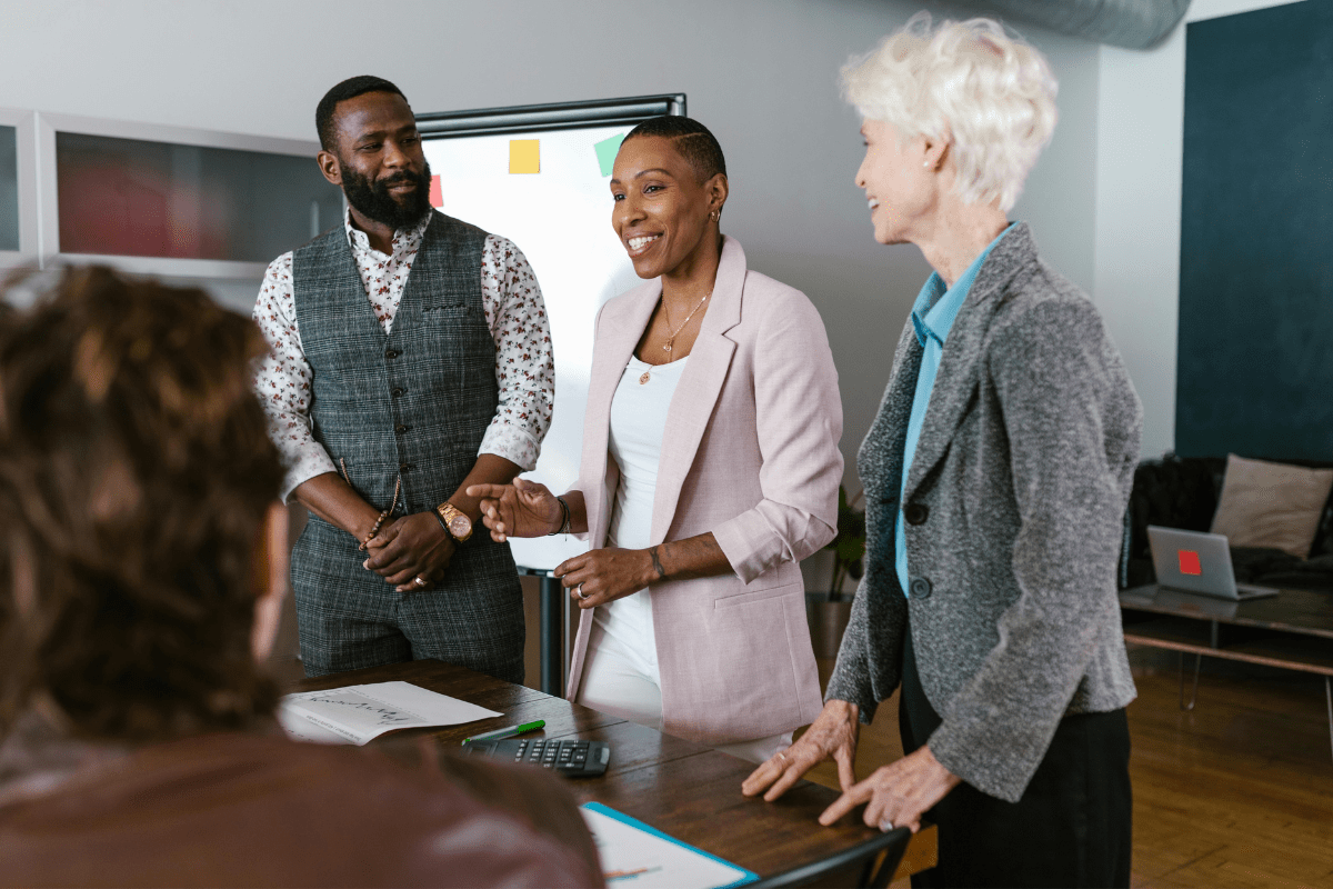 Secure Business Funding - How to Start a Swimming Pool Cleaning Business A Group of People are Standing Discussing About Ways to Secure Funding for Business Illustrating How to Start a Swimming Pool Cleaning Business