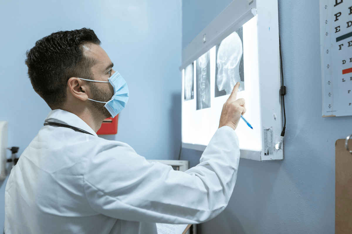 Locum Tenens - Physician Side Gigs and Side Hustles for Doctors A Doctor Can be Seen Examining X-rays Illustrating Some Physician Side Gigs and Side Hustles for Doctors