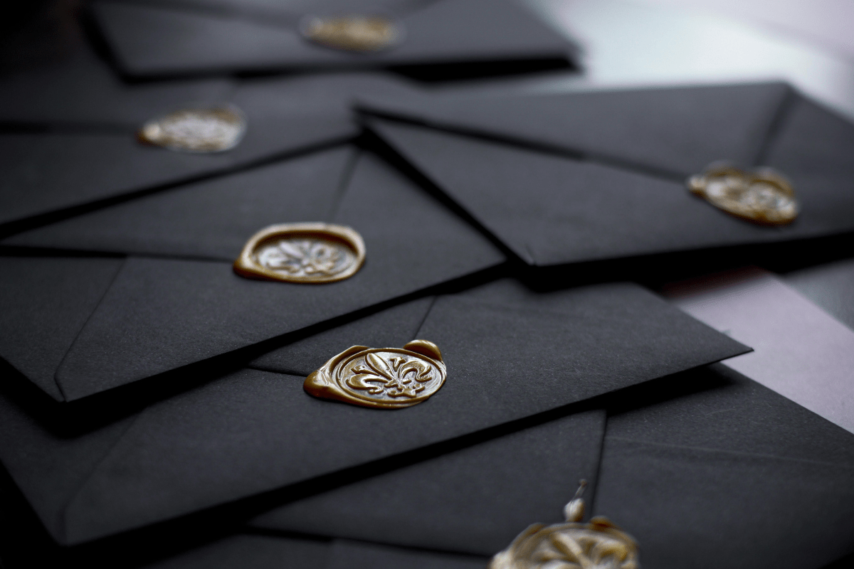 Navy Blue Colored Various Envelopes Placed on a Surface Illustrating Envelope Writing Side Hustle 