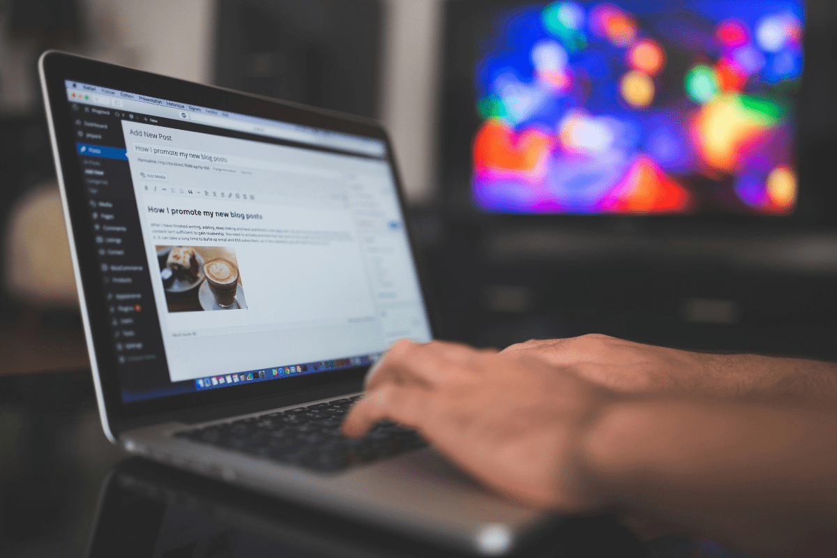Educational Blog - Easy Side Hustles for Teachers. A Person Working on Laptop with WordPress Open Illustrating Blogging as an Easy Side Hustles for Teachers.