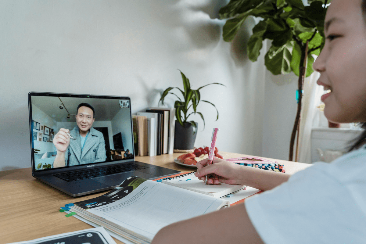 Online Teaching - Easy Side Hustles for Teachers A Teacher Tutoring Via a Video Call Illustrating Teaching Online. Easy Side Hustles For Teachers