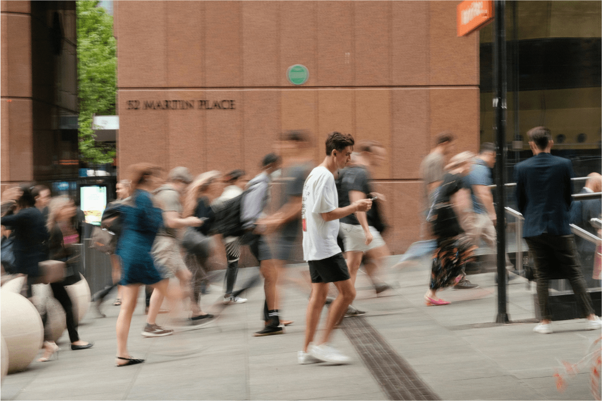 Many People Walking Towards a Building Showing Rush Hour Illustrating Is DoorDash a Good Side Hustle