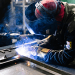 A Person Is Seen Welding Illustrating Welding Side Hustle Ideas