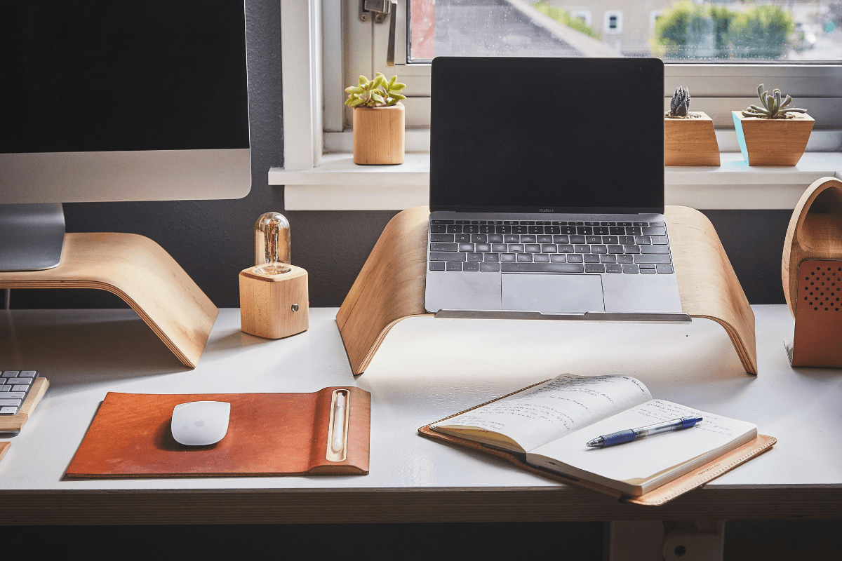 Start a Drop Shipping Business -Online Side Hustles from Home Laptops Can Be Seen Placed on a Table With an Open Notebook Lying Illustrating Online Side Hustles from Home