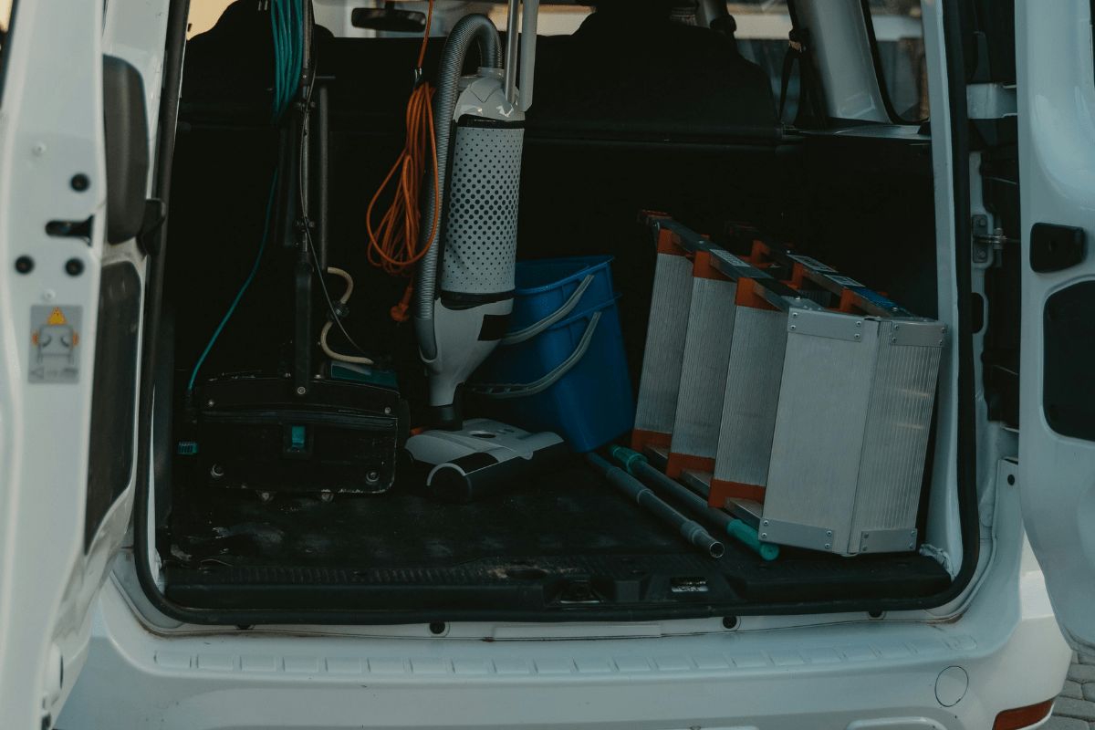 Gather Cleaning Equipment - How to Start a Move out Cleaning Business The Back of a Van Displaying Cleaning Equipment Illustrating How to Start a Move out Cleaning Business