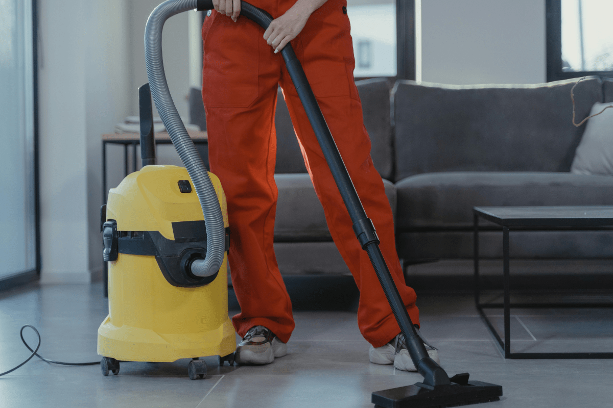 How to Start a Move Out Cleaning Business A Person Can Be Seen Vacuuming the Place Illustrating How to Start a Move Out Cleaning Business