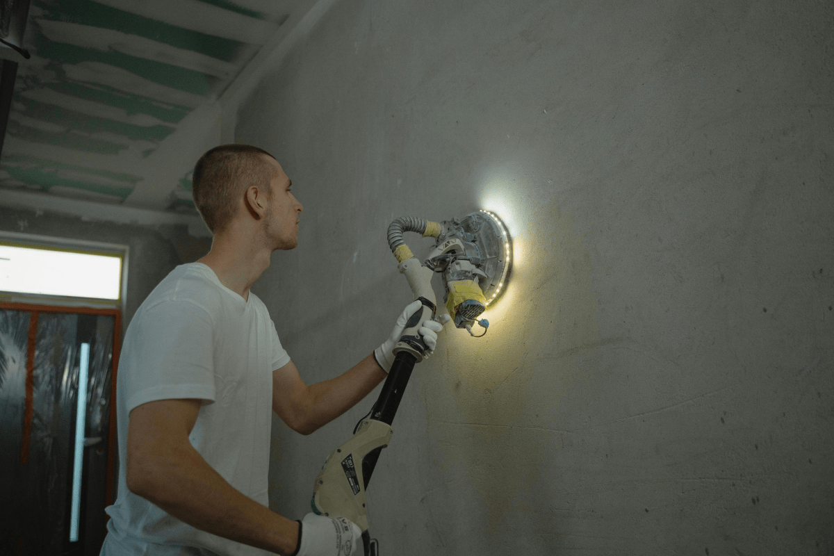 A Man is Doing Handyman Job Illustrating Side Hustles for Men 